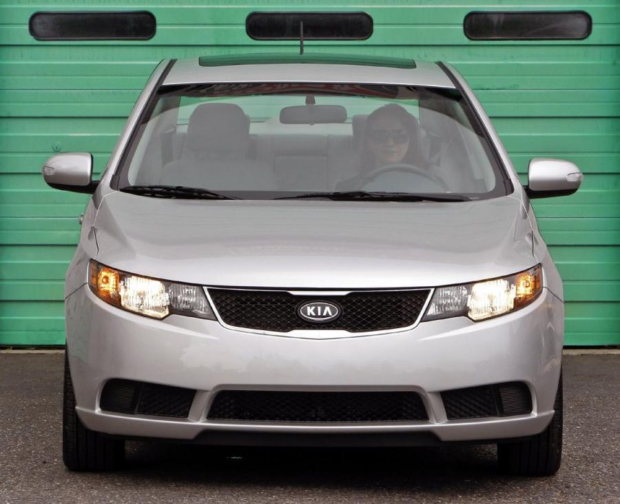  Kia Forte 2010 года  (фото 16 из 18)